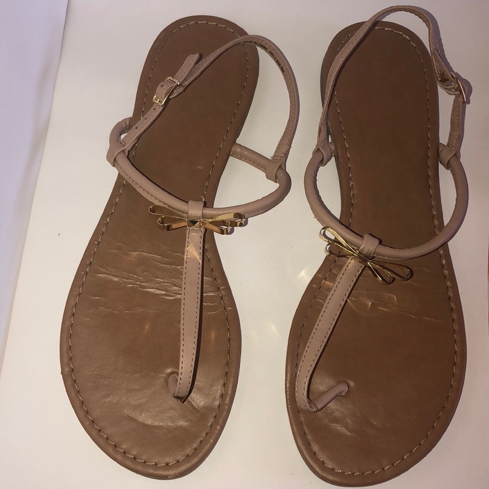 Tan and gold bow sandals